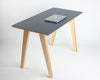 dark grey top with ply desk legs 